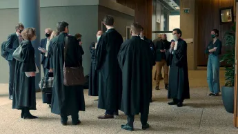 Scene from the documentary "Duty of Care" by Nic Balthazar: Lawyers in gowns