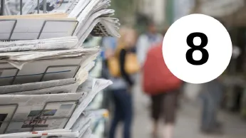 Newspaper rack on street