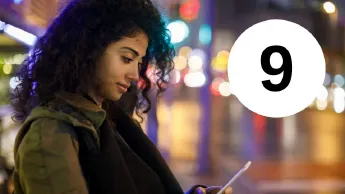 Young woman on the street at night