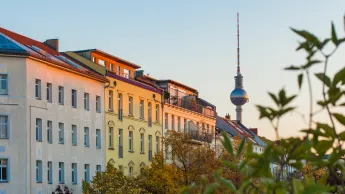 Several apartment buildings in Berlin Prenzlauer-Berg, in the background you can see the Berlin TV Tower.