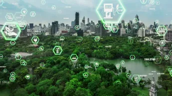 Green city technology icons set against a backdrop of a big city in a green setting