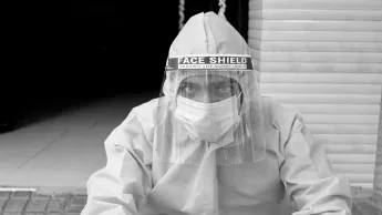 Young man wearing a face shield during the COVID-19 Pandemic